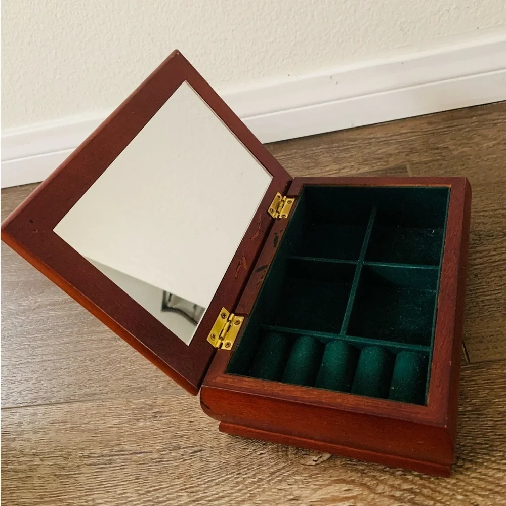 Wooden box with a mirror